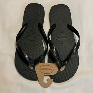 Havaianas size 13 men's Brazilian made black flip-flops.  NWT